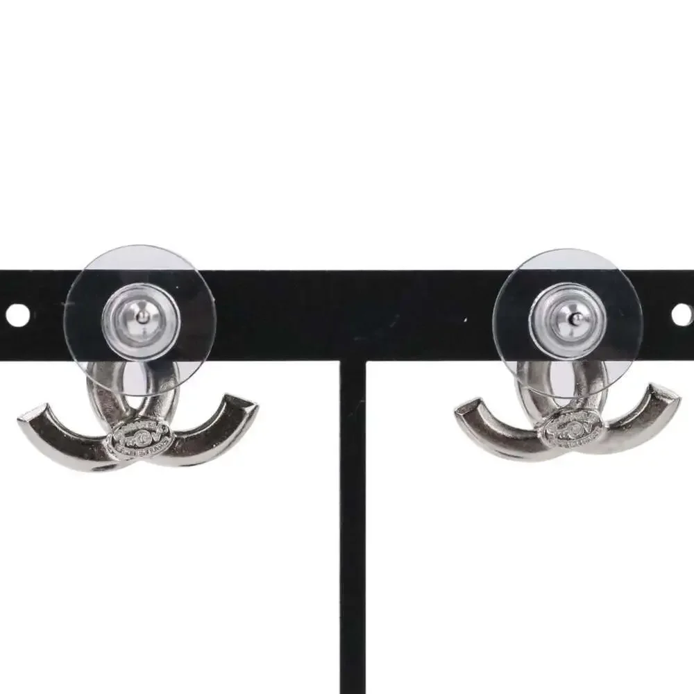 CHANEL Silver Logo Earrings